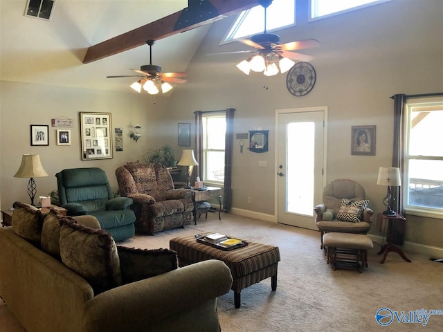 carpeted living room featuring high vaulted ceiling, plenty of natural light, and ceiling fan