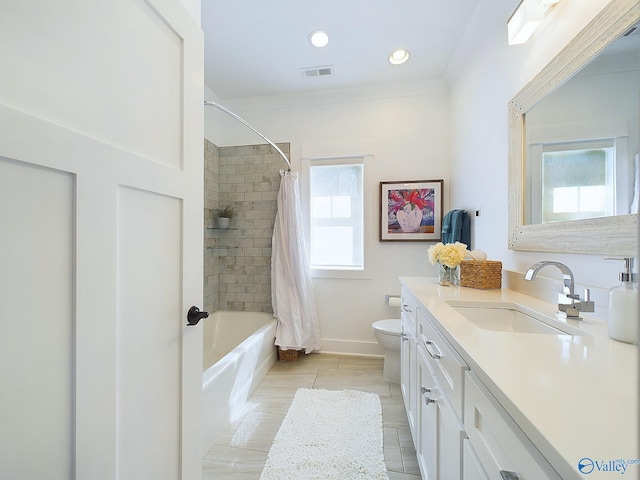 full bathroom with shower / bath combo, vanity, and toilet