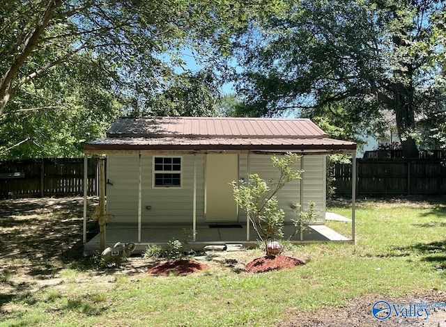 view of shed featuring a fenced backyard