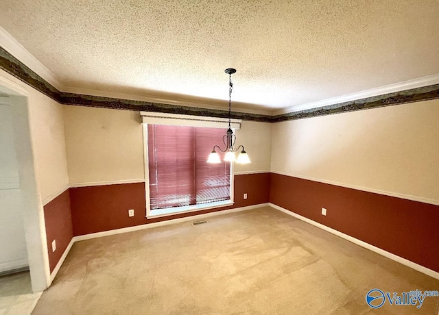 unfurnished dining area featuring a textured ceiling, carpet flooring, visible vents, and an inviting chandelier