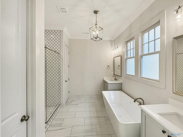 bathroom featuring an inviting chandelier, ornamental molding, vanity, and shower with separate bathtub