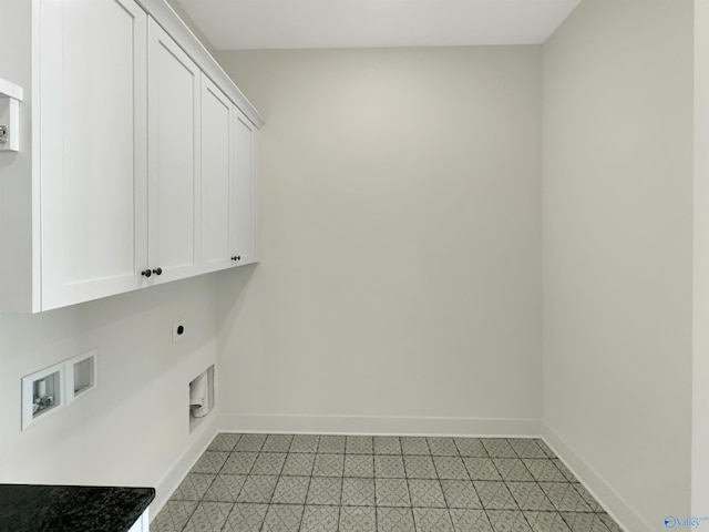 washroom featuring cabinets, hookup for a washing machine, and hookup for an electric dryer