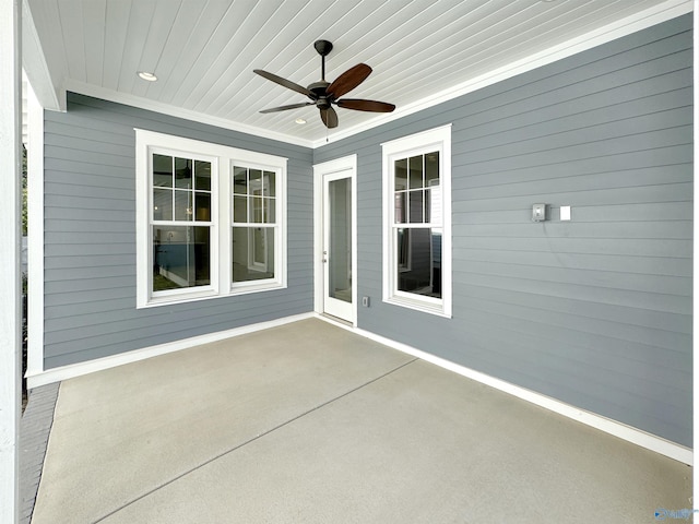 view of patio featuring ceiling fan