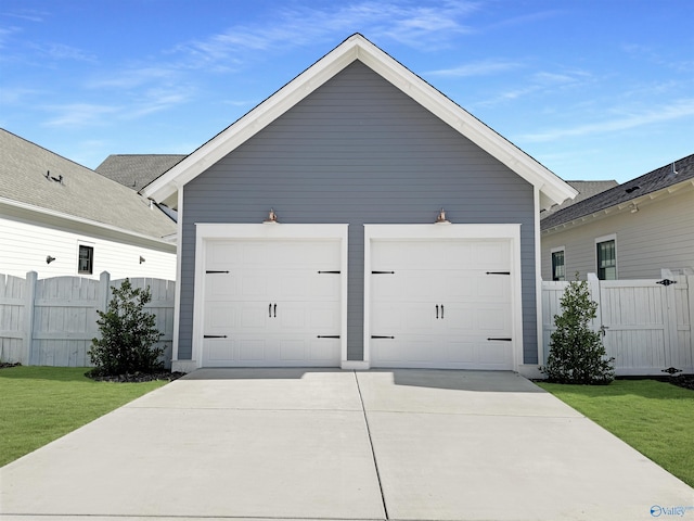 garage with a lawn