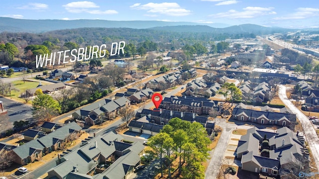 birds eye view of property featuring a mountain view