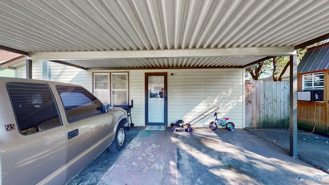 exterior space featuring a carport