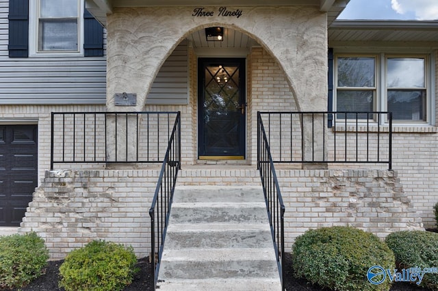 entrance to property featuring a garage