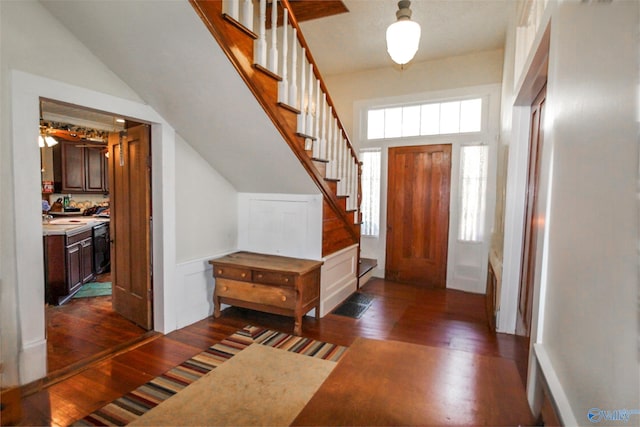 foyer with dark hardwood / wood-style floors