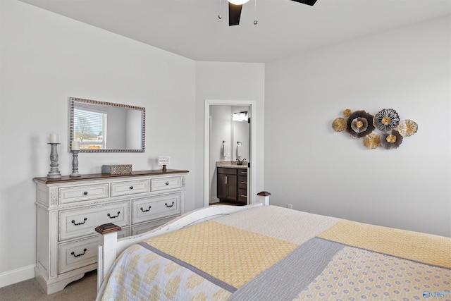 24009 Quints Dr, Athens, AL 35613 - bedroom with light carpet, baseboards, ensuite bathroom, and a ceiling fan