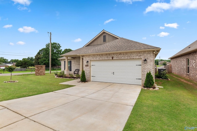 24009 Quints Dr, Athens, AL 35613 - single story home with driveway, an attached garage, brick siding, and board and batten siding