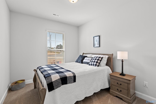 24009 Quints Dr, Athens, AL 35613 - carpeted bedroom featuring baseboards