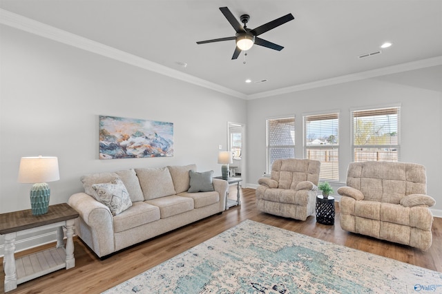 24009 Quints Dr, Athens, AL 35613 - living room with ornamental molding, wood finished floors, a ceiling fan, recessed lighting, and baseboards