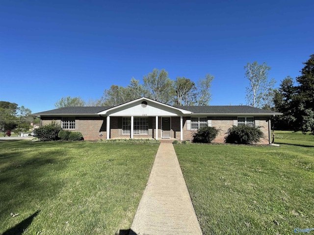 single story home with a front yard