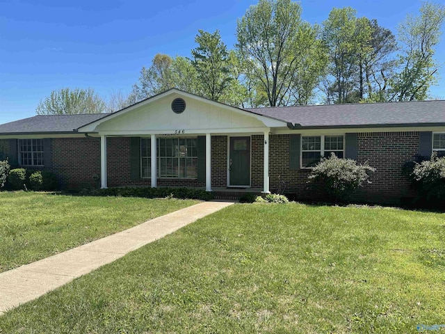 ranch-style home with a front yard