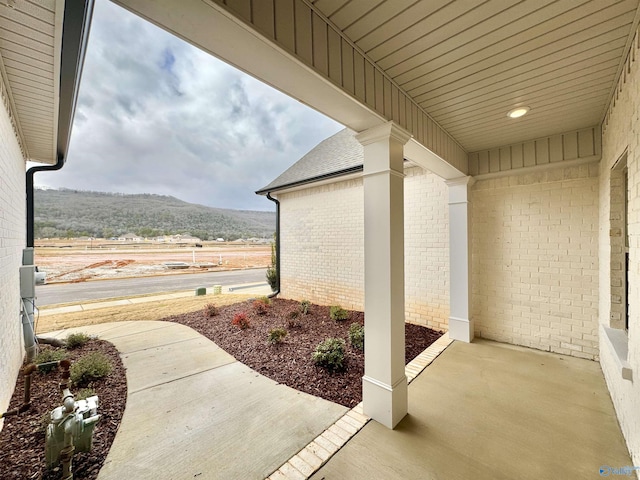 view of patio with a mountain view