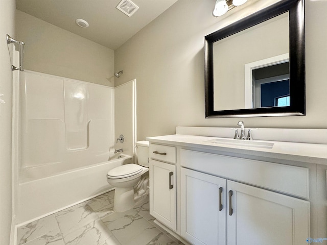 full bathroom featuring vanity, bathing tub / shower combination, and toilet