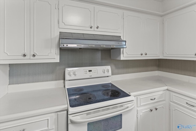 105 Hastings Rd, Athens, AL 35613 - kitchen with electric stove, range hood, white cabinetry, and light countertops