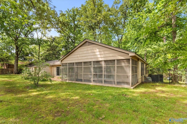 105 Hastings Rd, Athens, AL 35613 - view of outdoor structure with a sunroom