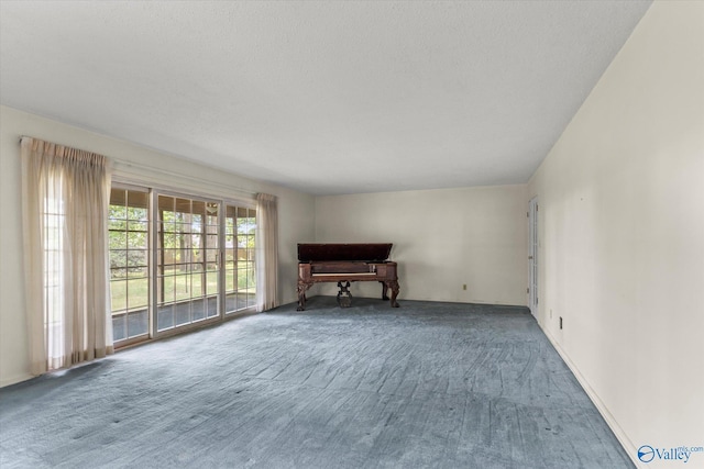 105 Hastings Rd, Athens, AL 35613 - living area with carpet and a textured ceiling