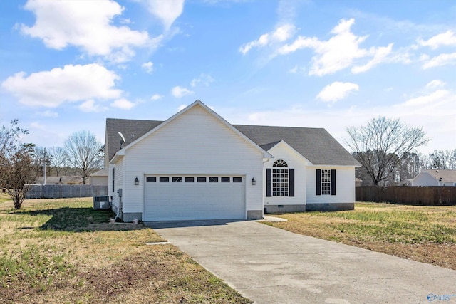 ranch-style home featuring crawl space, driveway, an attached garage, and fence