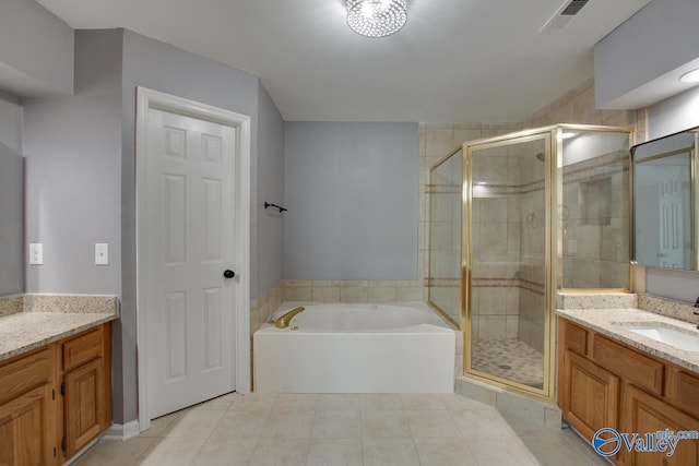 full bath featuring tile patterned floors, visible vents, a stall shower, vanity, and a bath