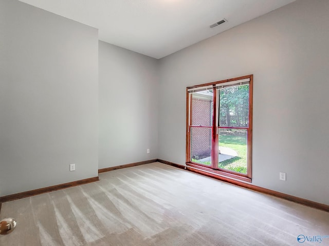 view of carpeted spare room