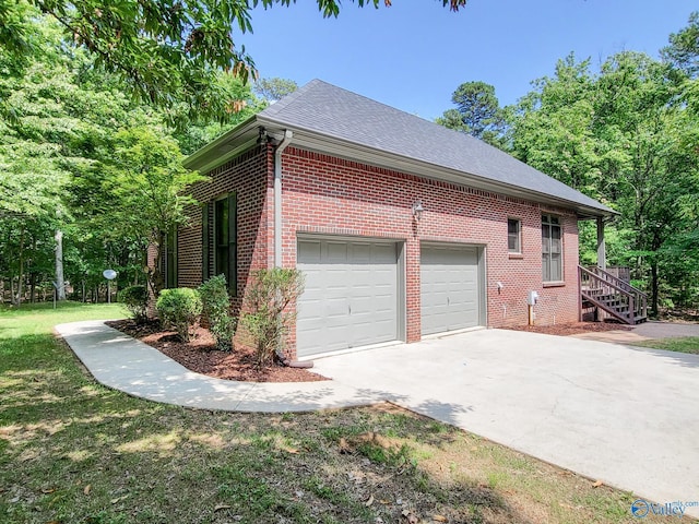 view of side of property featuring a garage