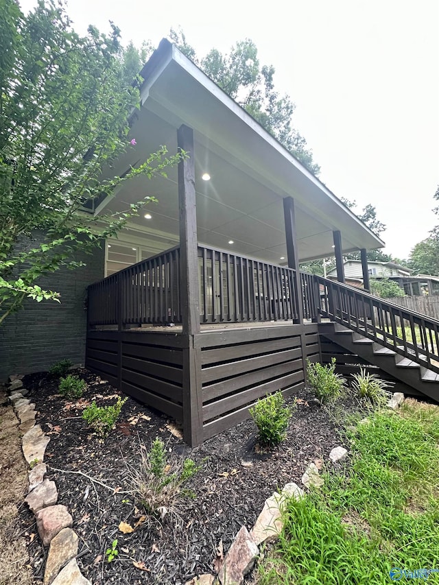 view of home's exterior featuring a deck