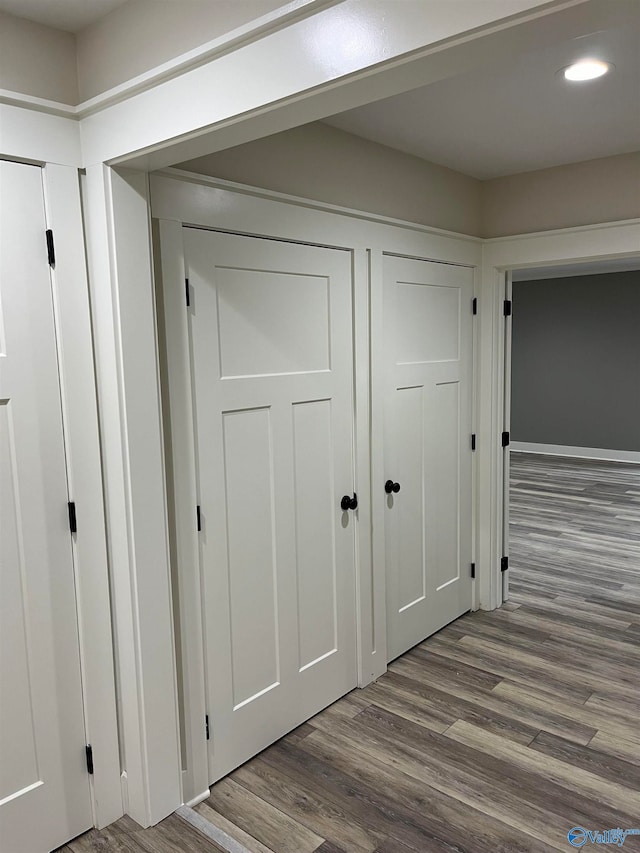 corridor featuring hardwood / wood-style flooring