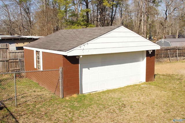 detached garage with fence