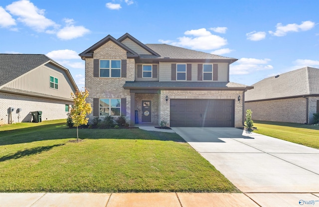 view of front facade featuring a garage and a front yard