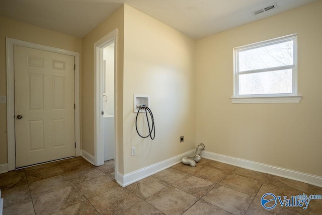 laundry room with laundry area, washer hookup, visible vents, baseboards, and electric dryer hookup