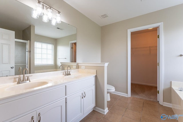 full bathroom with tile patterned flooring, vanity, toilet, and shower with separate bathtub