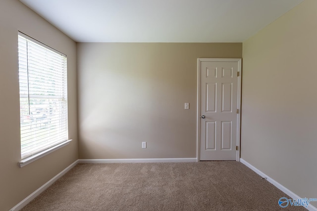 view of carpeted spare room