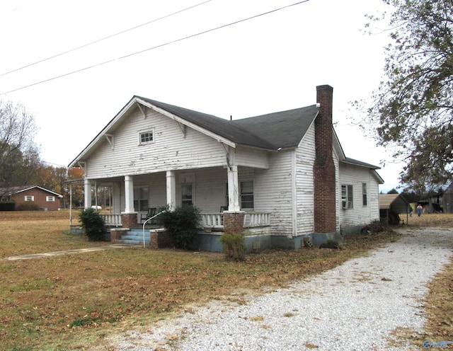 bungalow-style home featuring covered porch