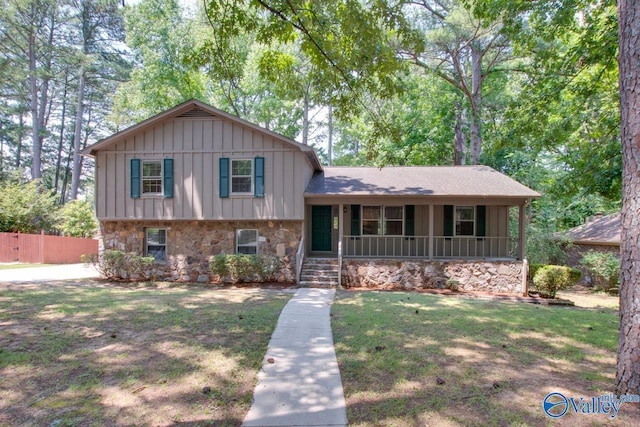 split level home with a front yard