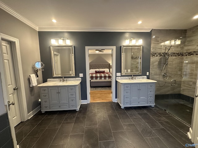 bathroom featuring vanity, hardwood / wood-style flooring, a shower with door, and crown molding