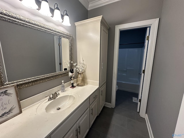 full bathroom with tile patterned floors, ornamental molding, vanity, bathing tub / shower combination, and toilet