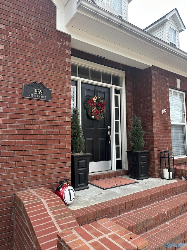 entrance to property with a porch