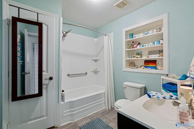 full bathroom with vanity, tile patterned floors, shower / tub combo, and toilet