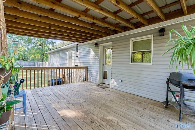 wooden terrace with grilling area