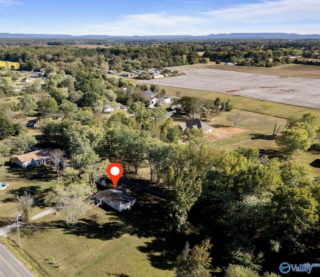 birds eye view of property featuring a rural view