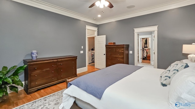25 Cypress Grove Ln, Huntsville, AL 35824 - bedroom featuring crown molding, light wood-style floors, recessed lighting, a ceiling fan, and baseboards