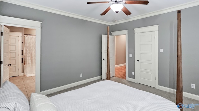 25 Cypress Grove Ln, Huntsville, AL 35824 - bedroom with crown molding, baseboards, ceiling fan, and ensuite bath