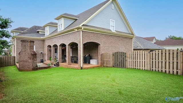 25 Cypress Grove Ln, Huntsville, AL 35824 - rear view of property with brick siding, a gate, and a shingled roof