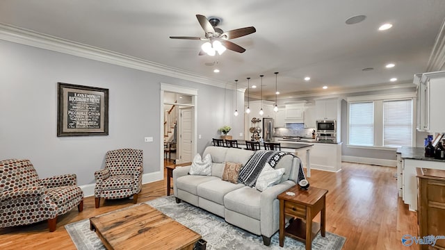 25 Cypress Grove Ln, Huntsville, AL 35824 - living area featuring crown molding, ceiling fan, baseboards, recessed lighting, and light wood-type flooring