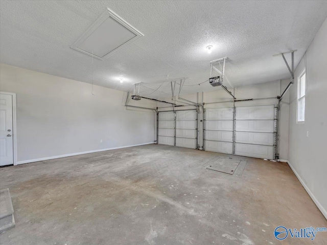 768 County Road 376, Hillsboro, AL 35643 - garage featuring a garage door opener and baseboards