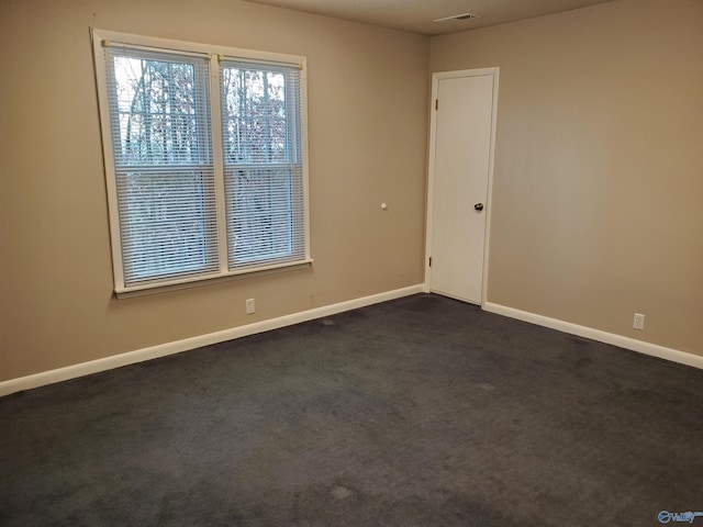 view of carpeted spare room