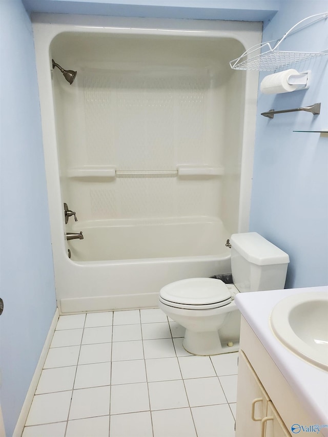 full bathroom featuring washtub / shower combination, tile patterned floors, vanity, and toilet