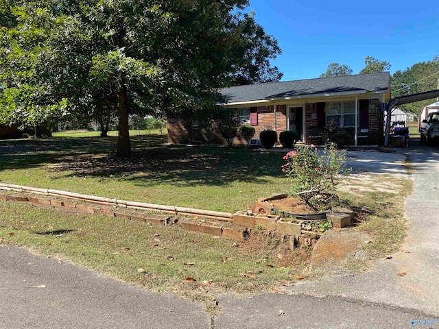 ranch-style house with a front lawn